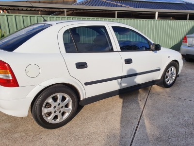 Holden Astra Hatch 2005 used car part search White front drivers side door and right side guard.
Factory white.
