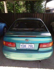 Toyota Paseo Sedan 1996 used car part search Right hand fender green colour. Greenish colour.